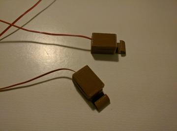 These are the housings for the bone conductor transducers.