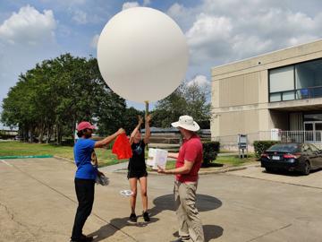 My colleague, Vishnu Kadiyala, had the opportunity to help some University of Houston peers launch a weather balloon. This picture was taken at the moment of release.